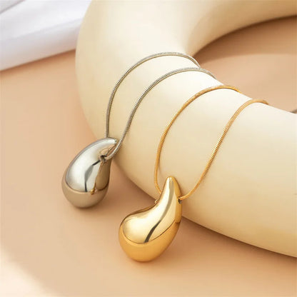 Boucle d'oreille et Collier Goutte d'eau